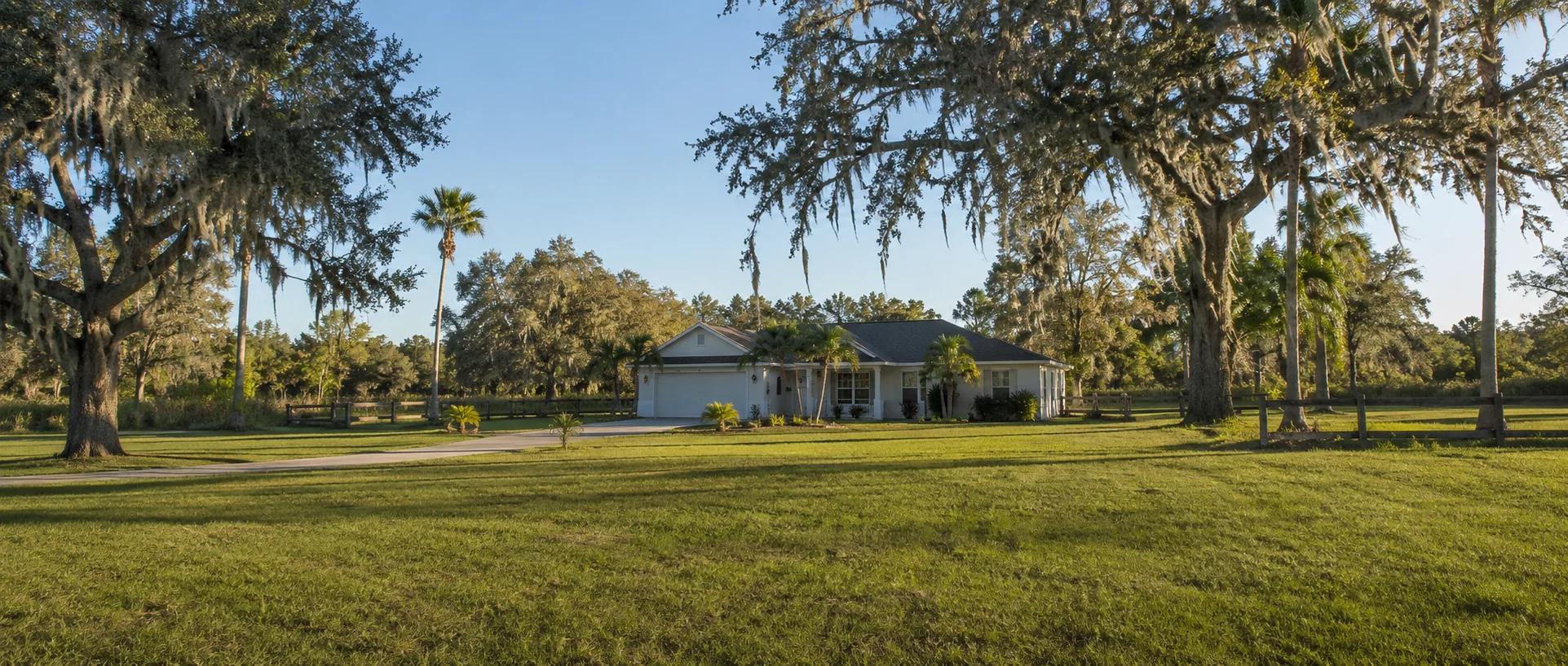 Established homes and mature landscaping in a North Fort Myers neighborhood near the water.
