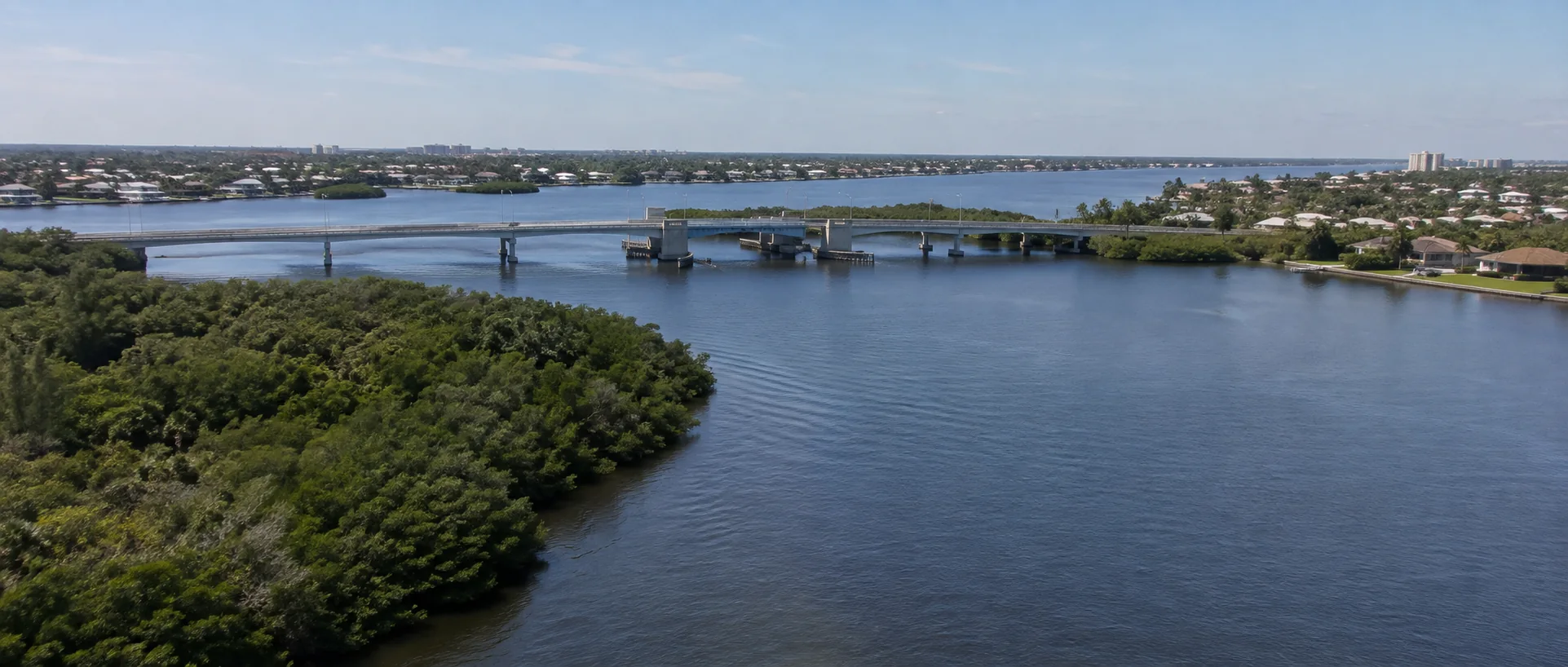 Landscaped residential community with homes and a lake in south Fort Myers near the Sanibel corridor.