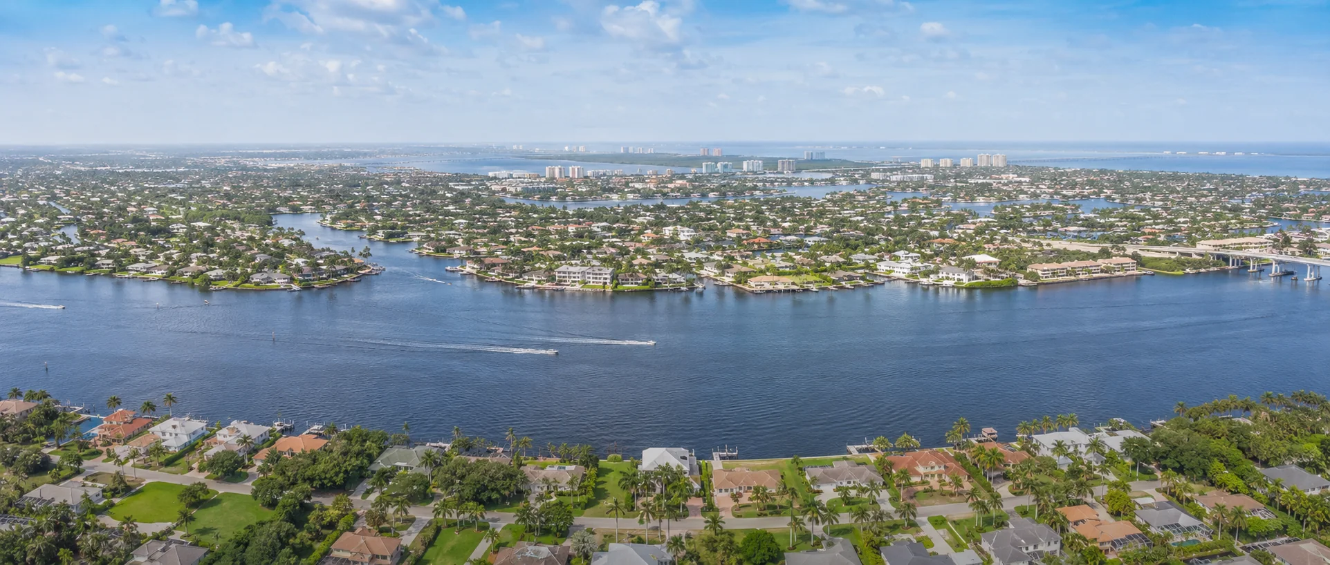 Broad view of the Caloosahatchee River and surrounding Cape Coral and Fort Myers communities.