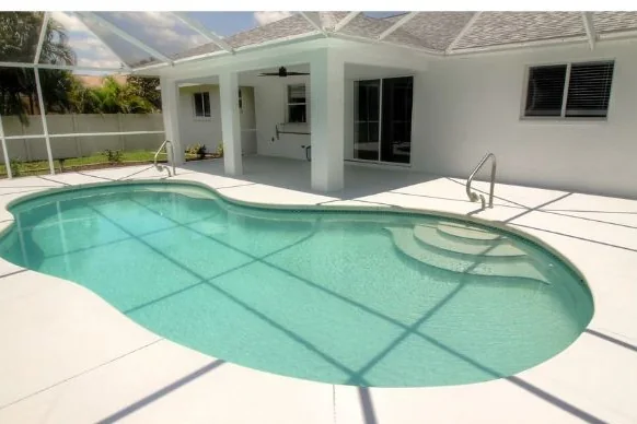 Screened pool and lanai at a Cape Coral waterfront home