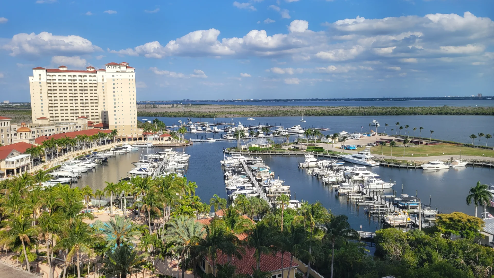 Marina view near Tarpon Point, Cape Coral, with boats docked along the water