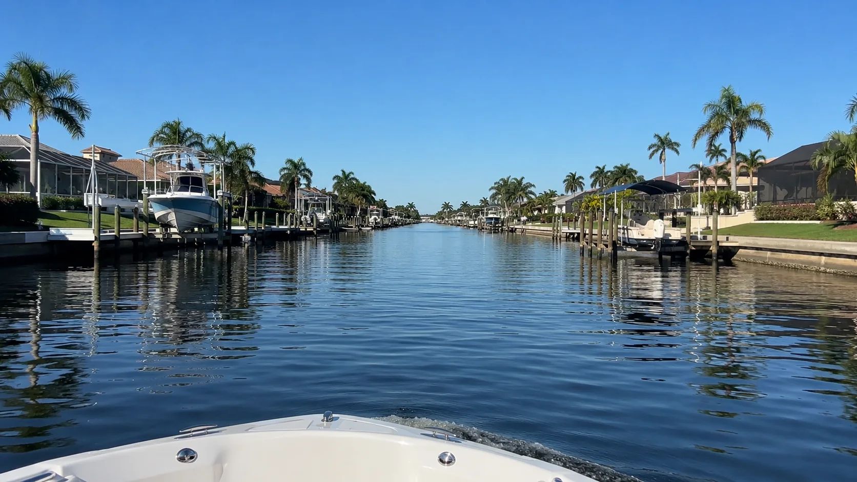 A long Cape Coral residential canal route illustrating the travel required before reaching open water.