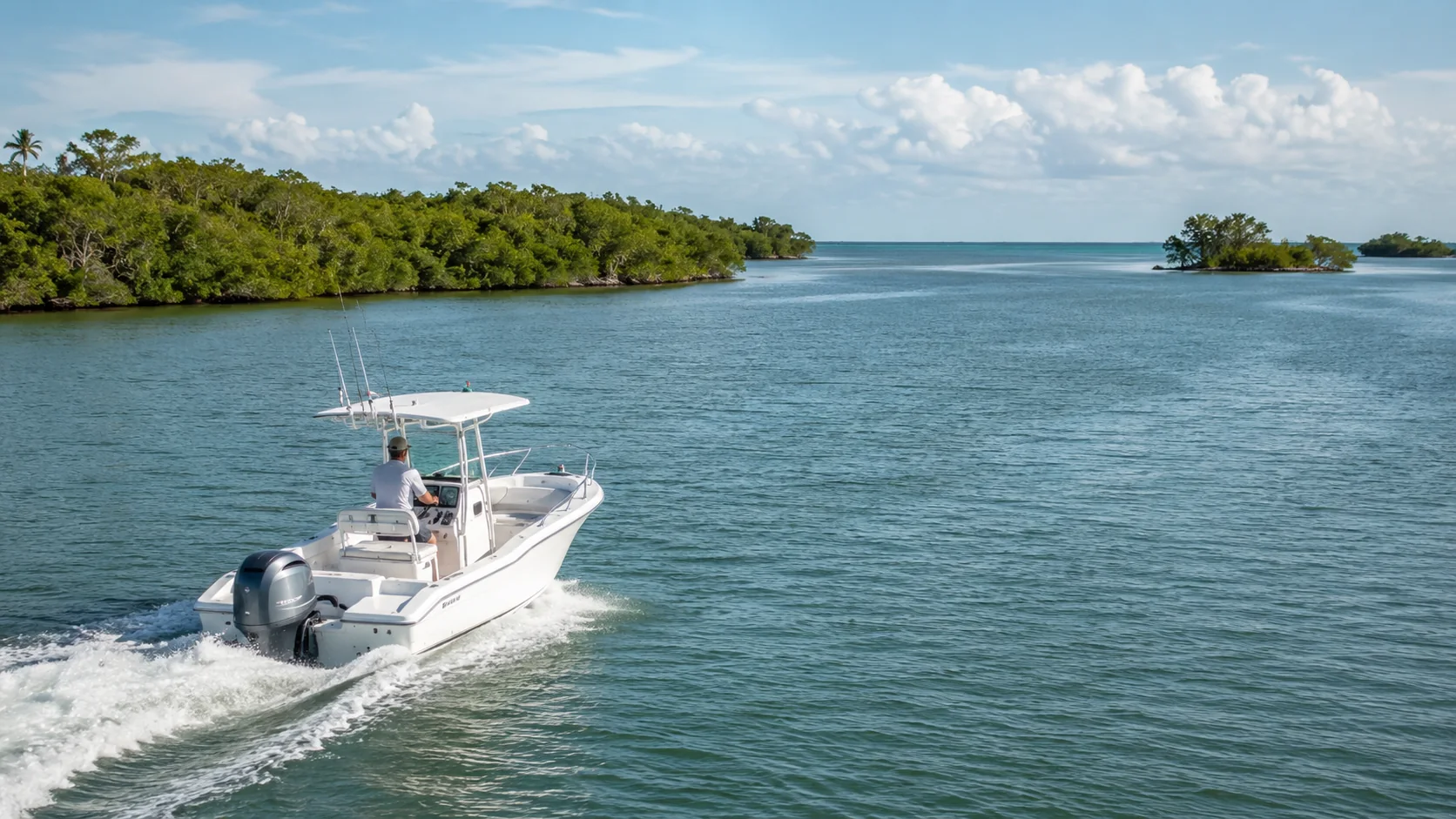 A center-console boat with its operator heading from protected Southwest Florida waterways toward open Gulf water.